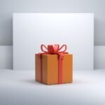 an orange gift box with a red bow